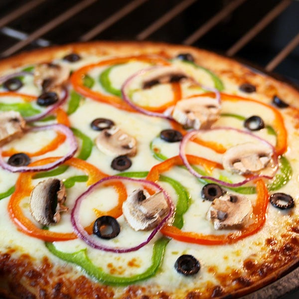 vegetable pizza in oven