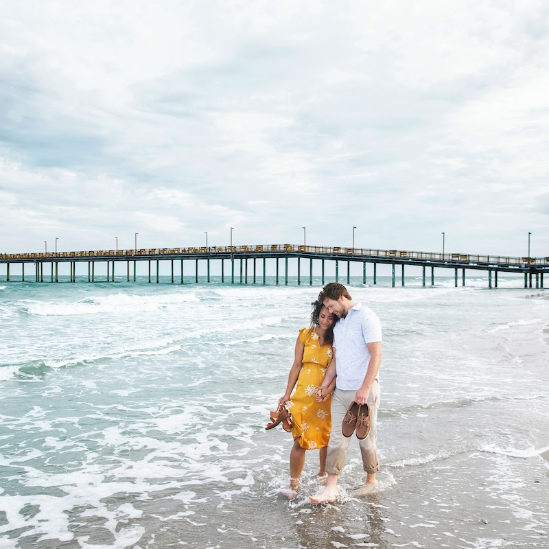 couple beach and pier scene by K2 Productions Photography