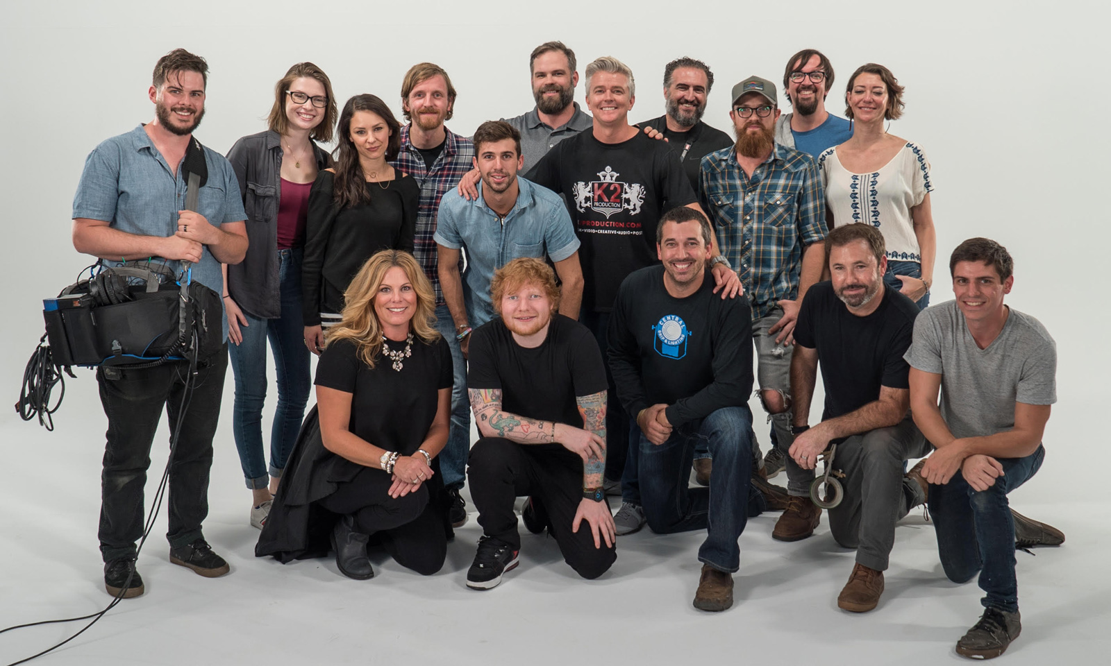K2 team posing with Ed Sheeran after a shoot